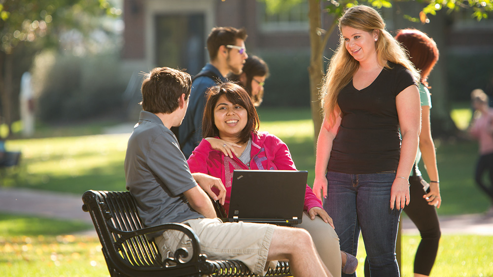 Students socialize on PennWest California's campus.