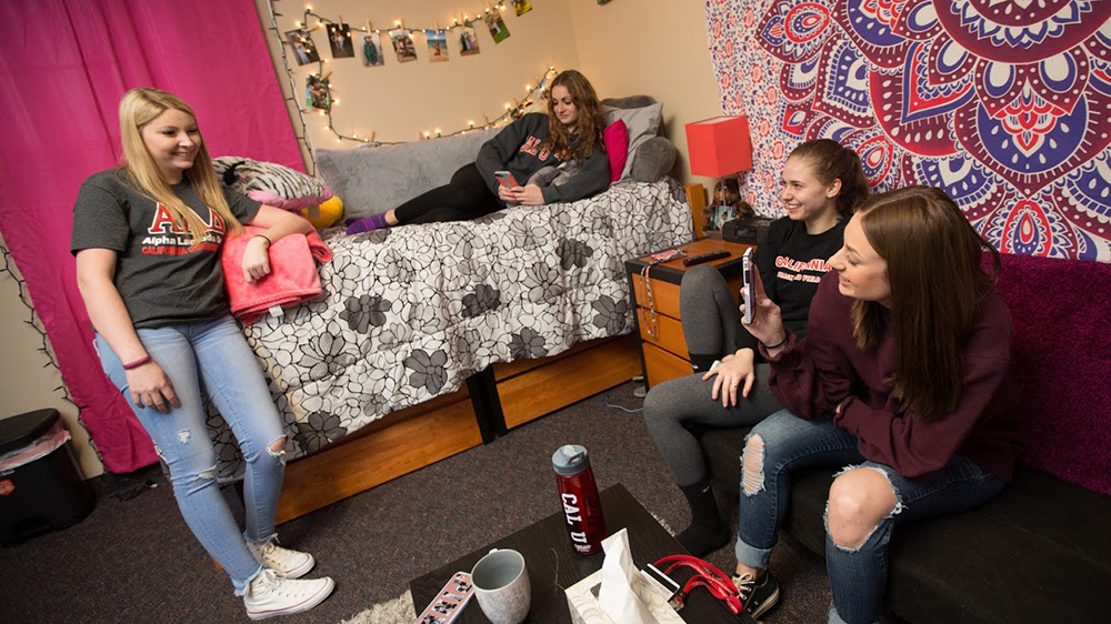 Students relax in a residence hall.